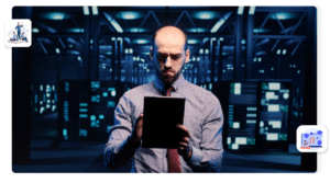 IT management blog featured photo man standing in front of data center 